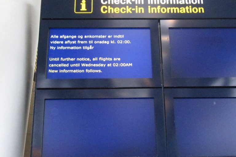Flight information screen at Copenhagen Airport during cancellations